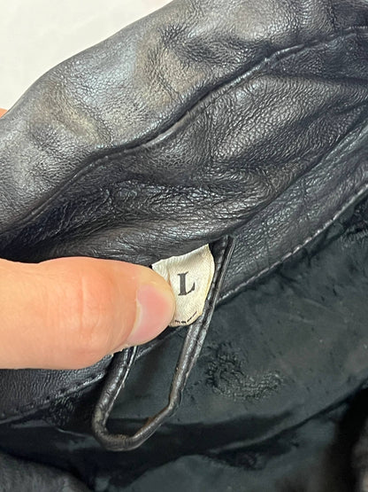 Bomber black leather bomber jacket with flap pockets and patterned lining.