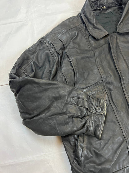 Bomber black leather bomber jacket with flap pockets and patterned lining.