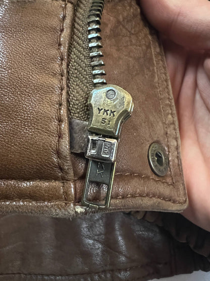 Bomber brown leather men's vintage bomber jacket with elasticized waist and flap pockets.
