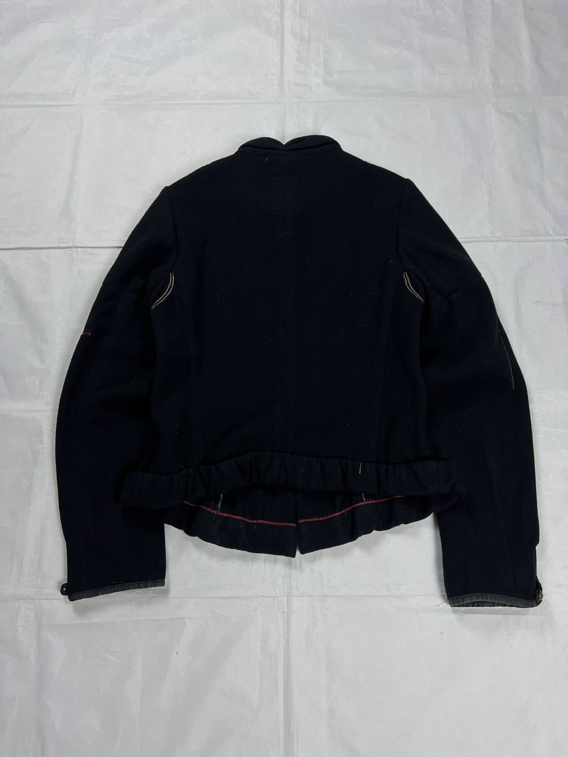 MARITHÉ & FRANÇOIS GIRBAUD black wool jacket unique toggle closure and contrast stitching details.