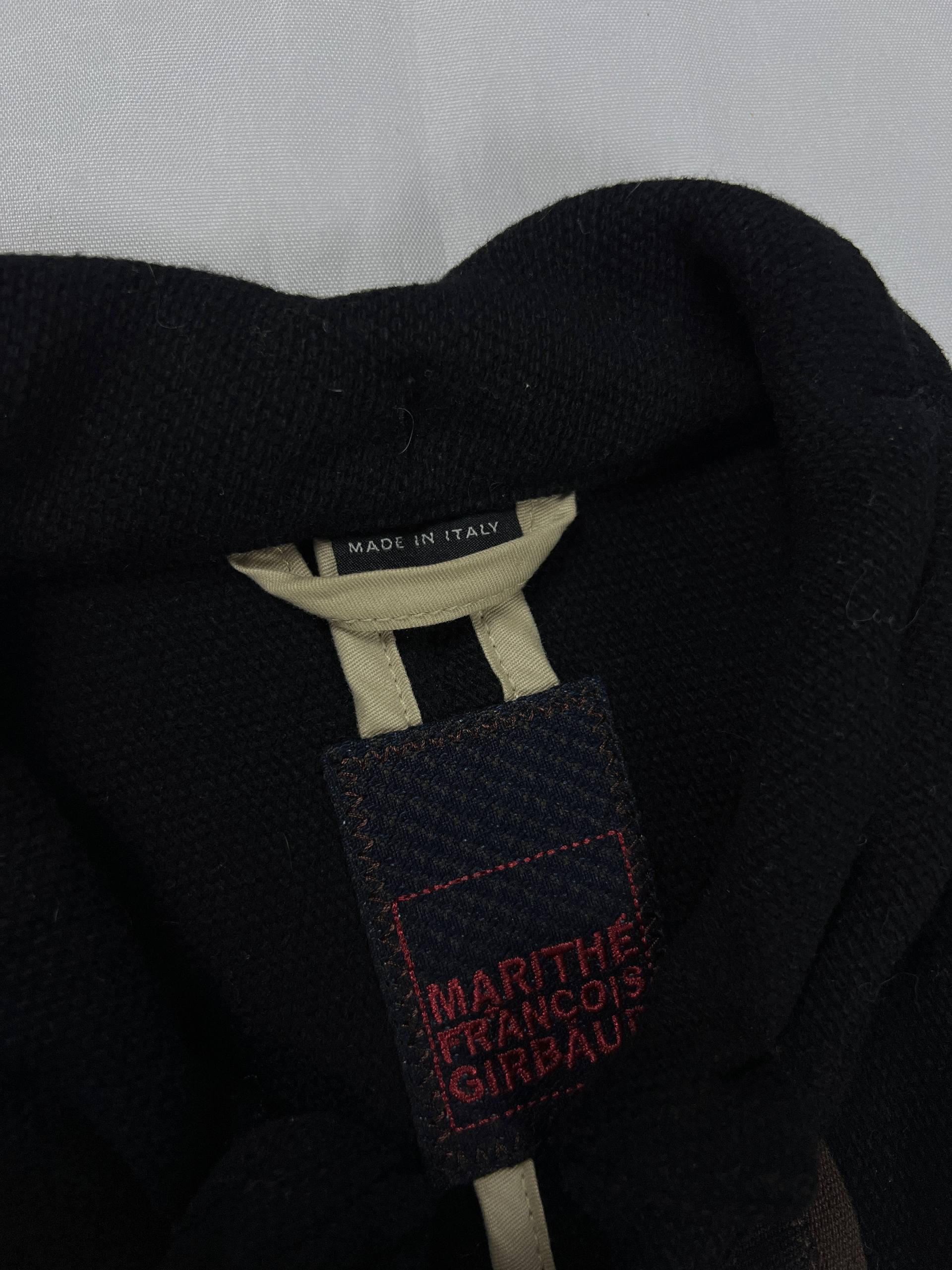 MARITHÉ & FRANÇOIS GIRBAUD black wool jacket unique toggle closure and contrast stitching details.