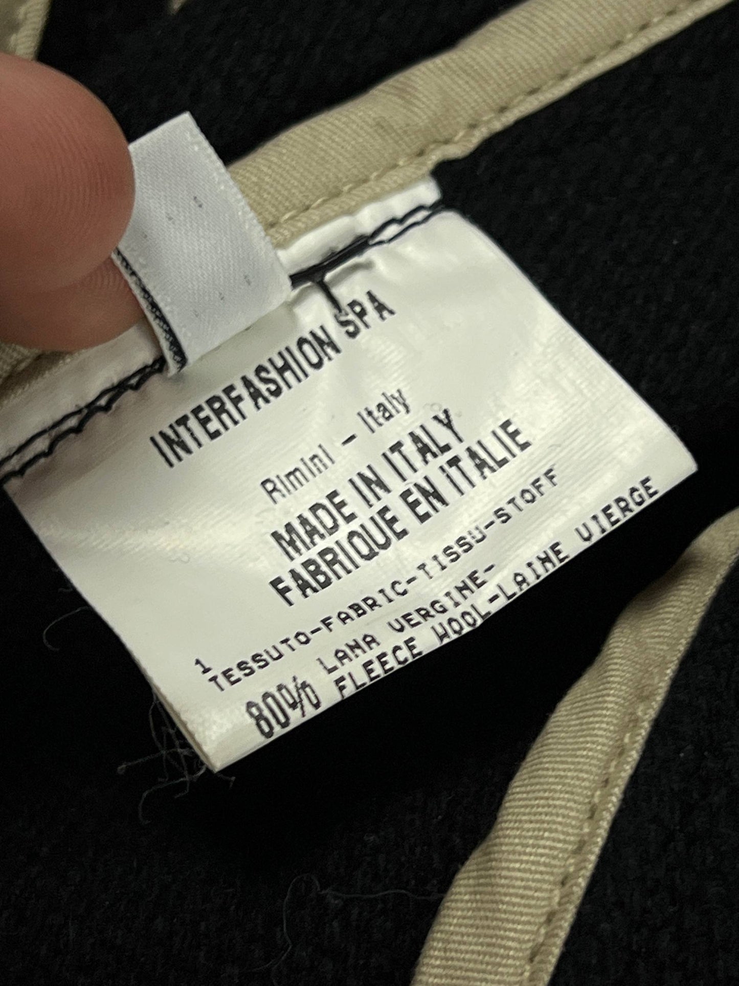 MARITHÉ & FRANÇOIS GIRBAUD black wool jacket unique toggle closure and contrast stitching details.