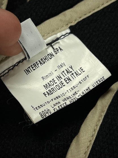 MARITHÉ & FRANÇOIS GIRBAUD black wool jacket unique toggle closure and contrast stitching details.