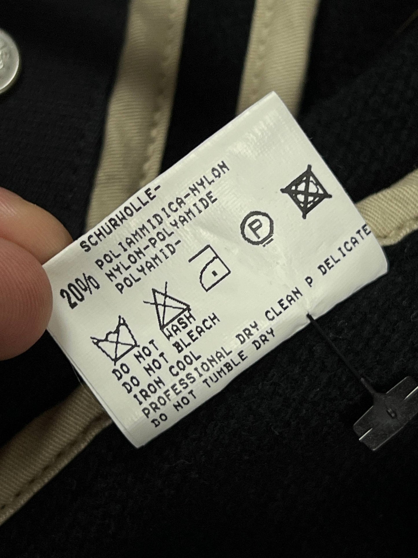 MARITHÉ & FRANÇOIS GIRBAUD black wool jacket unique toggle closure and contrast stitching details.