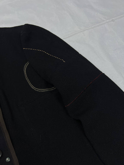 MARITHÉ & FRANÇOIS GIRBAUD black wool jacket unique toggle closure and contrast stitching details.